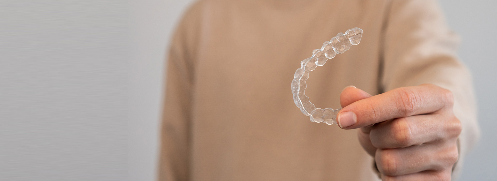 This is an image of a person s hand holding a clear, flexible bubble.