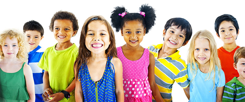 The image shows a group of children, each with distinct facial features and expressions, standing together in a joyful pose.